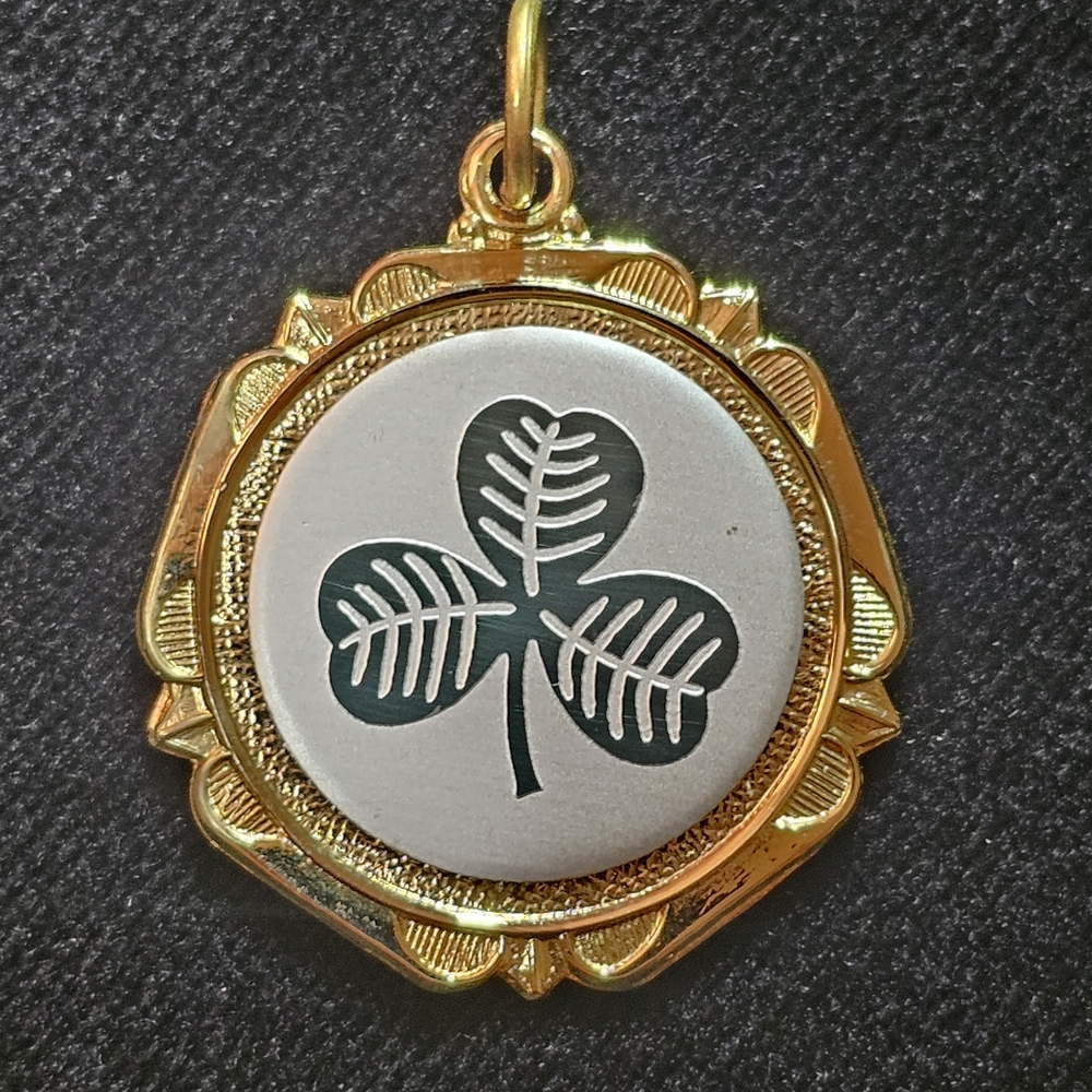 Gold and Silver Tone Clover Pendant